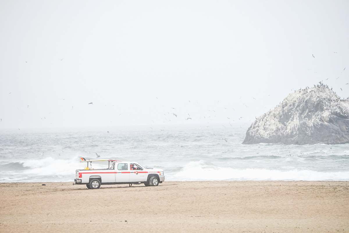 ocean beach white pickup truck near shore san francisco